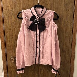 Pink Ruffled Blouse with Black Bow